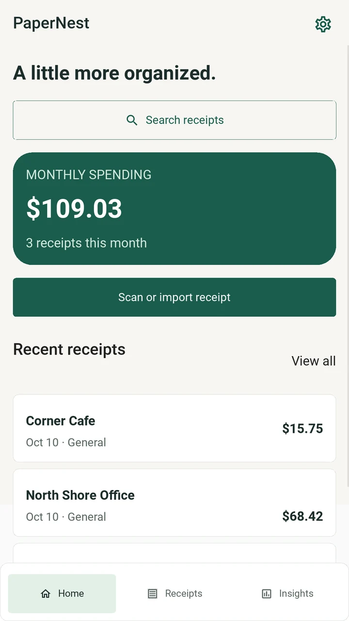 PaperNest home screen with a sample monthly spending summary.